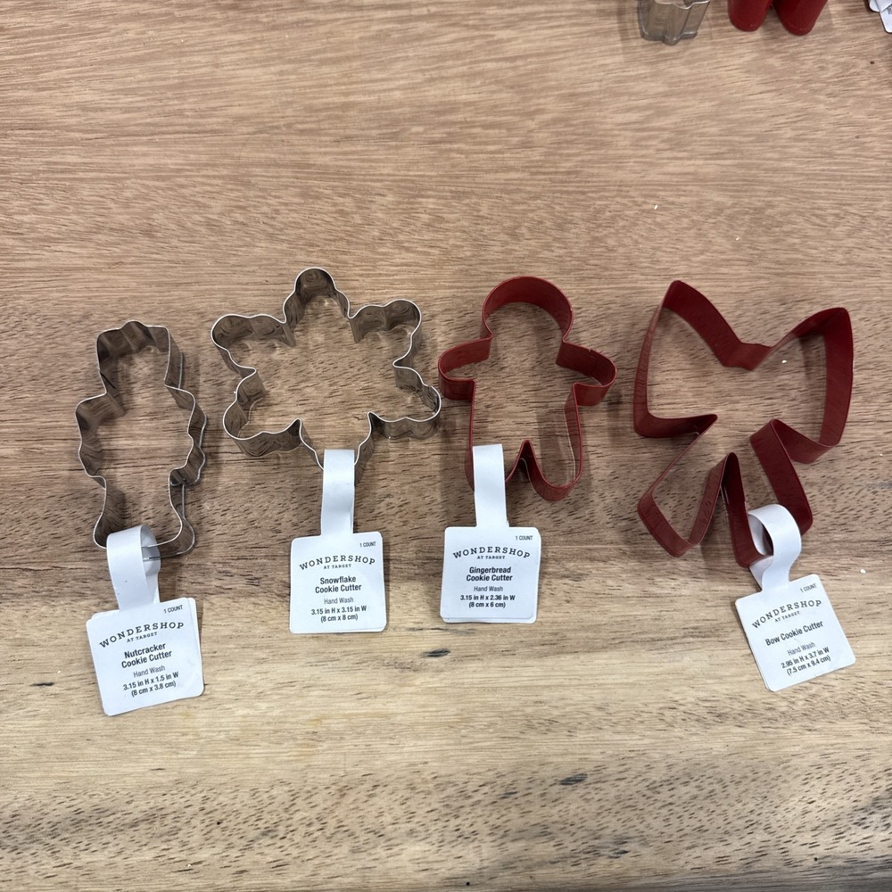 Set A Four Christmas Cookie Cutouts Nutcracker Snowflake Gingerbread Man And Bow